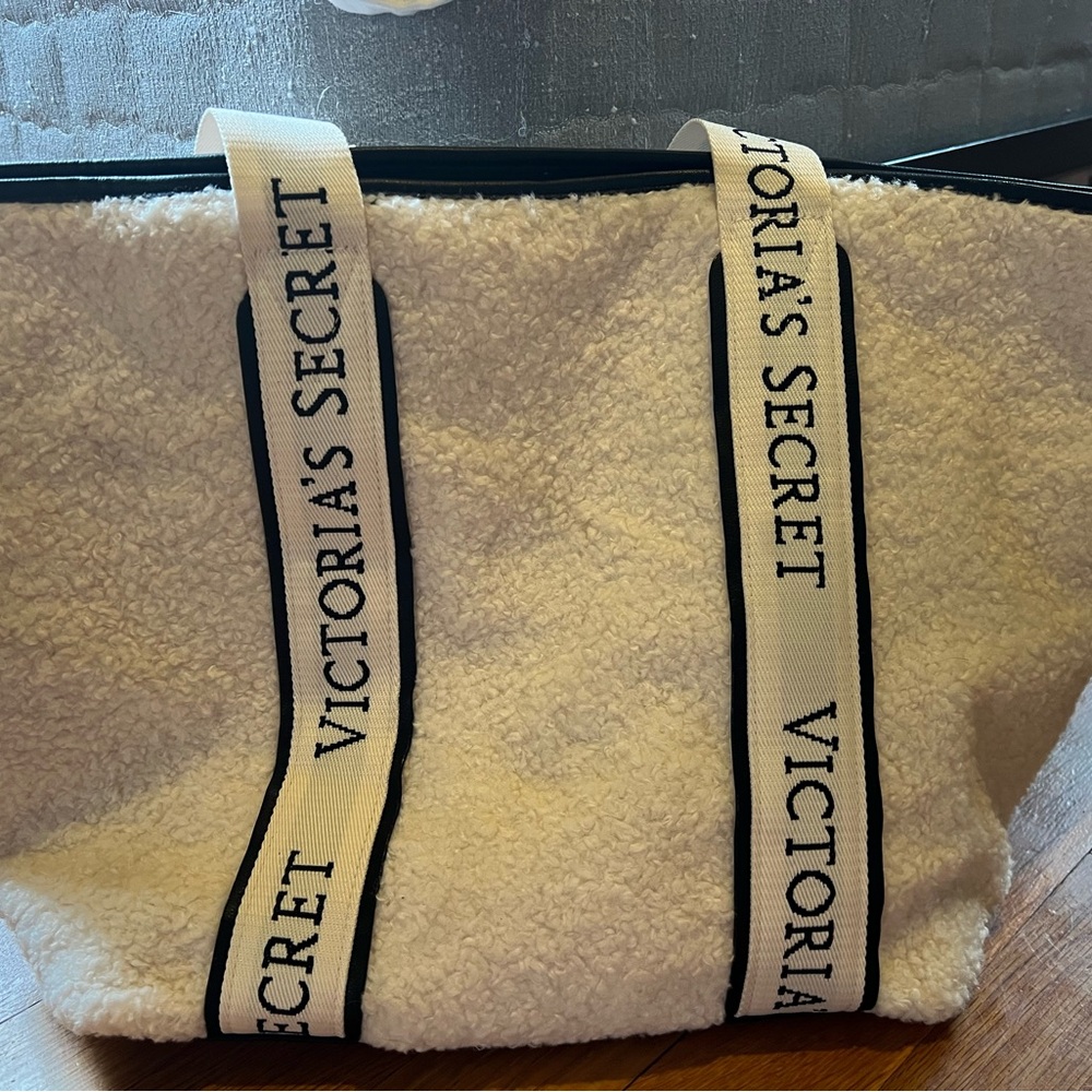 Large Victoria’s Secret off-white faux shearling tote bag with zipper closure